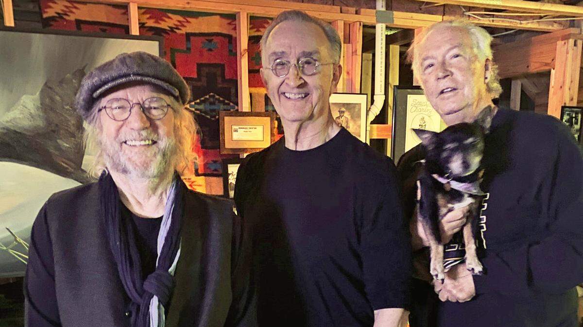 Doug Webb, left, Dan Monnat, center, and Phil Snow are all well-known, longtime Wichita musicians who formed the House Band during the pandemic and now are making their public debut at YaYa’s Saturday. Also pictured is Banjo, the band’s mascot who has attended every practice.
