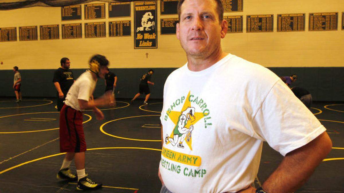 Bishop Carroll wrestling coach Mark Stovall in their practice room at Bishop Carroll High Friday. (Nov. 16, 2012)