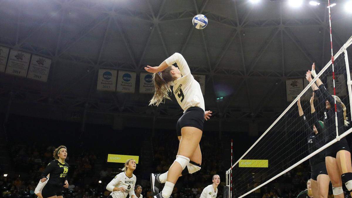 Wichita State outside hitter Alex Koon spikes the ball against the Tulane Green Wave during the home-opener in Koch Arena. (Sept. 21, 2018)