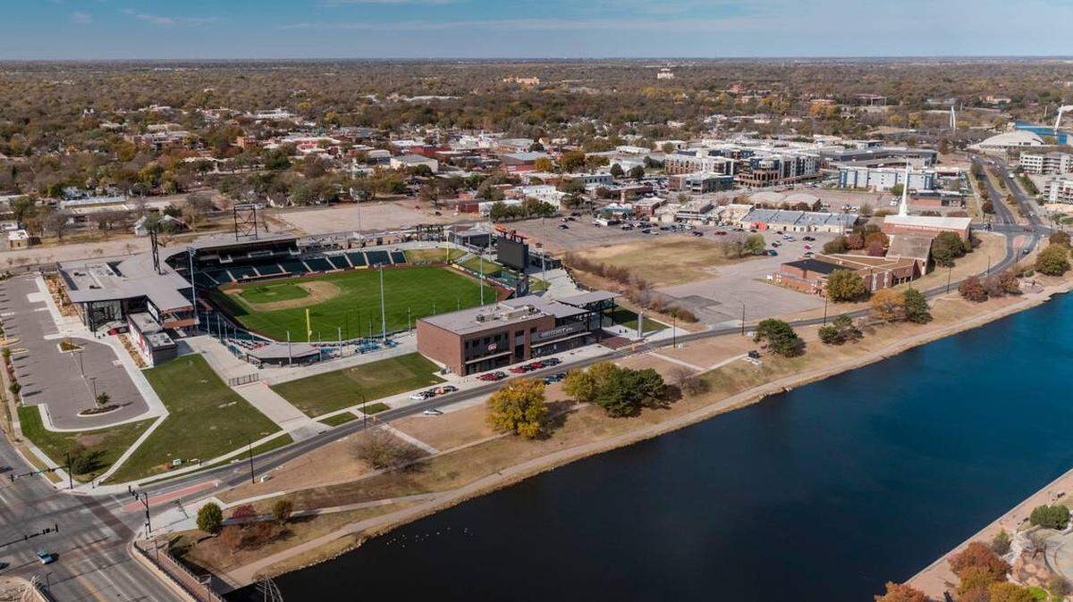 The planned $65 million development around Riverfront Stadium is a year behind and won’t meet its deadline. The Wind Surge development group now is likely out of the project, which will have slightly altered plans and cost north of $100 million.