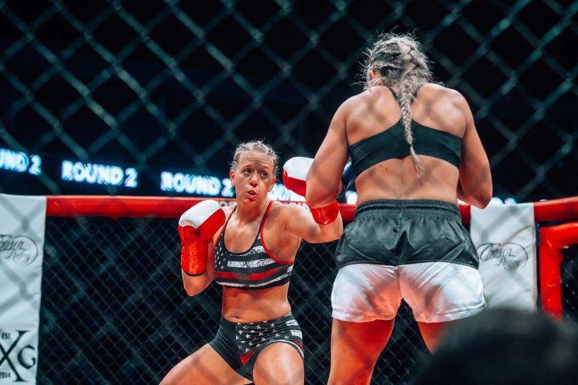 Wichita firefighter Carlye Anderson, left, is representing the city at the QuikTrip Smoke & Guns fight night for charity in Tulsa on Saturday to raise money for a burn camp.