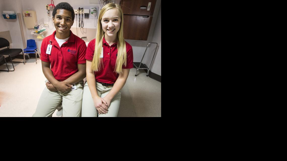 Daniel Alderson and Sarah Schreiber are participating in Wesley Medical Center’s Volunteen program. (July 13, 2014) 


