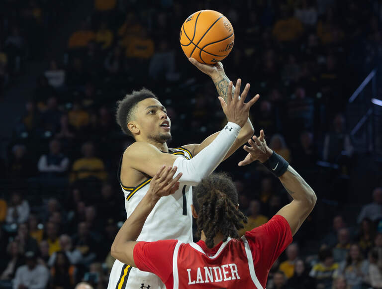 Xavier Bell Ringer Football background helps Xavier Bell on WSU basketball team | Wichita ...