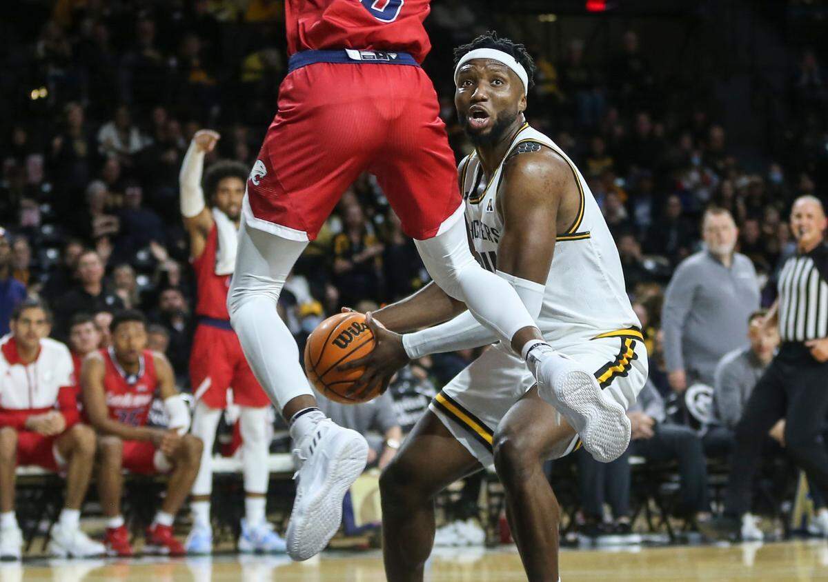 Wichita StateÕs Morris Udeze looks for a path to the basket during the first half of their game against South Alabama on Saturday at Koch Arena.