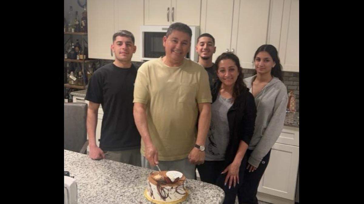 Hani Sami Stefan, 60, of Troy, Michigan, poses for a photo with his wife and their three children. Stefan, who goes by the name Giovanni, was killed in a 71-vehicle wreck in a March 14 western Kansas that killed eight people and injured 46 more.