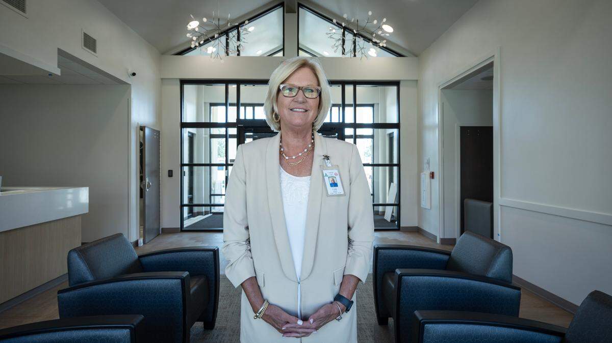 Catholic Care Center CEO Cindy LaFleur stands in the entry of St. Veronica Senior Behavioral Health Hospital at Catholic Care Center, a new acute-care hospital on the center’s Bel Aire retirement and healthcare campus. The hospital is slated to open the second week of July.
