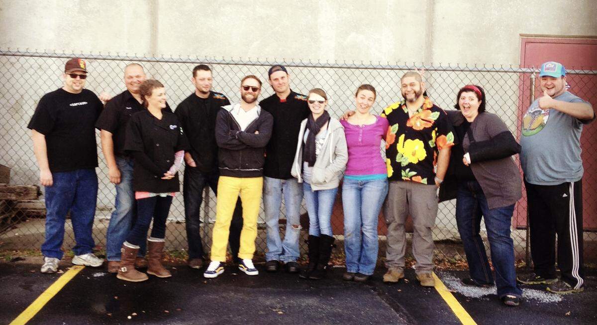 Jeff Schauf, fifth from left, and his brother Rob, sixth from left, posing with some of the earliest food truckers on the scene in 2012.