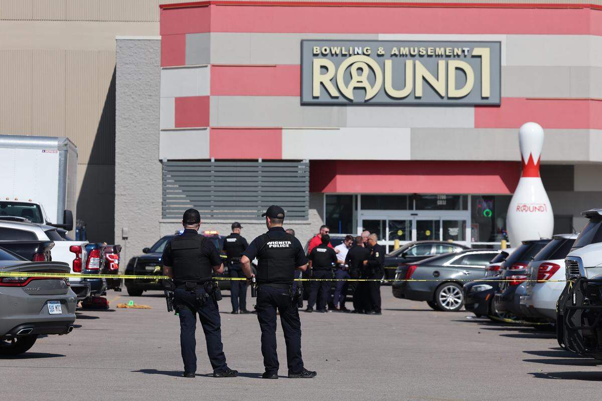 Police outside of Towne East Square mall on Friday afternoon after the report of a shooting.