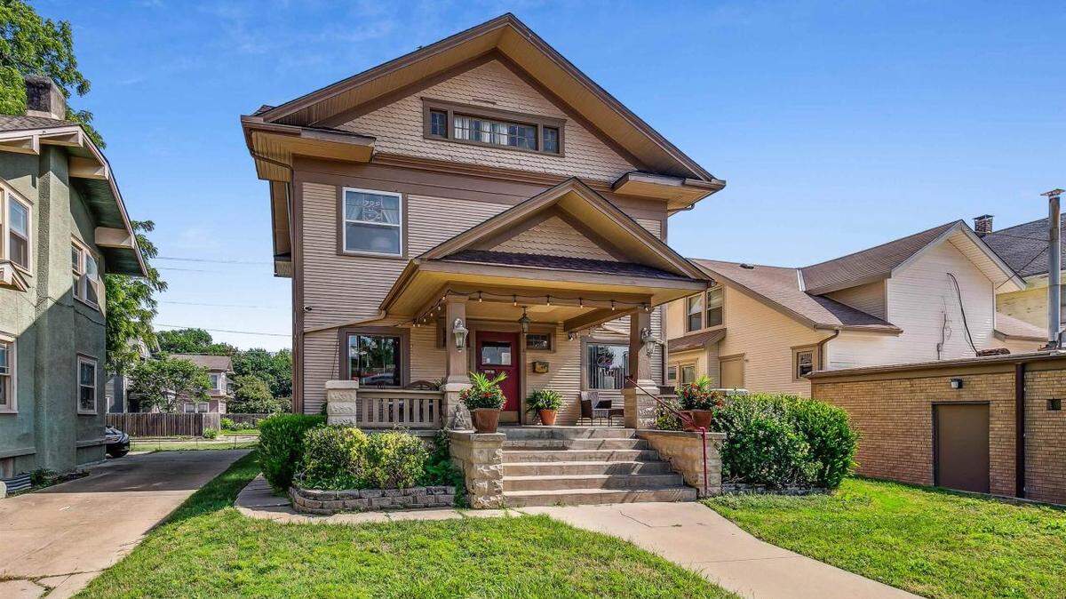 The 1909 house on East Douglas where Common Grounds Coffee House has operated since 2012 is now for sale. It sits directly across the street from Kwik Shop.