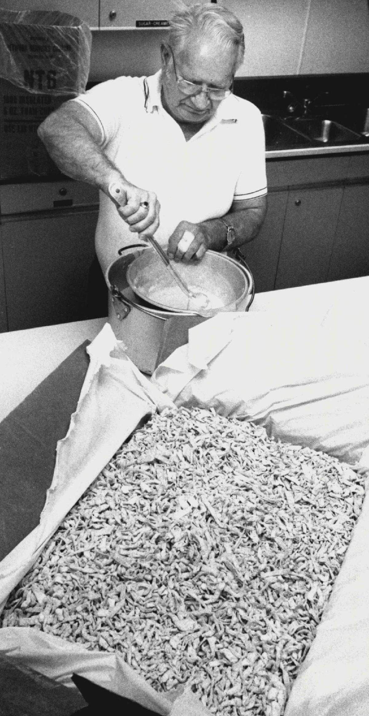 Jesse Ricketts is pictured in 1988 stirring gravy for the annual St. Paul’s Chicken Noodle Dinner.