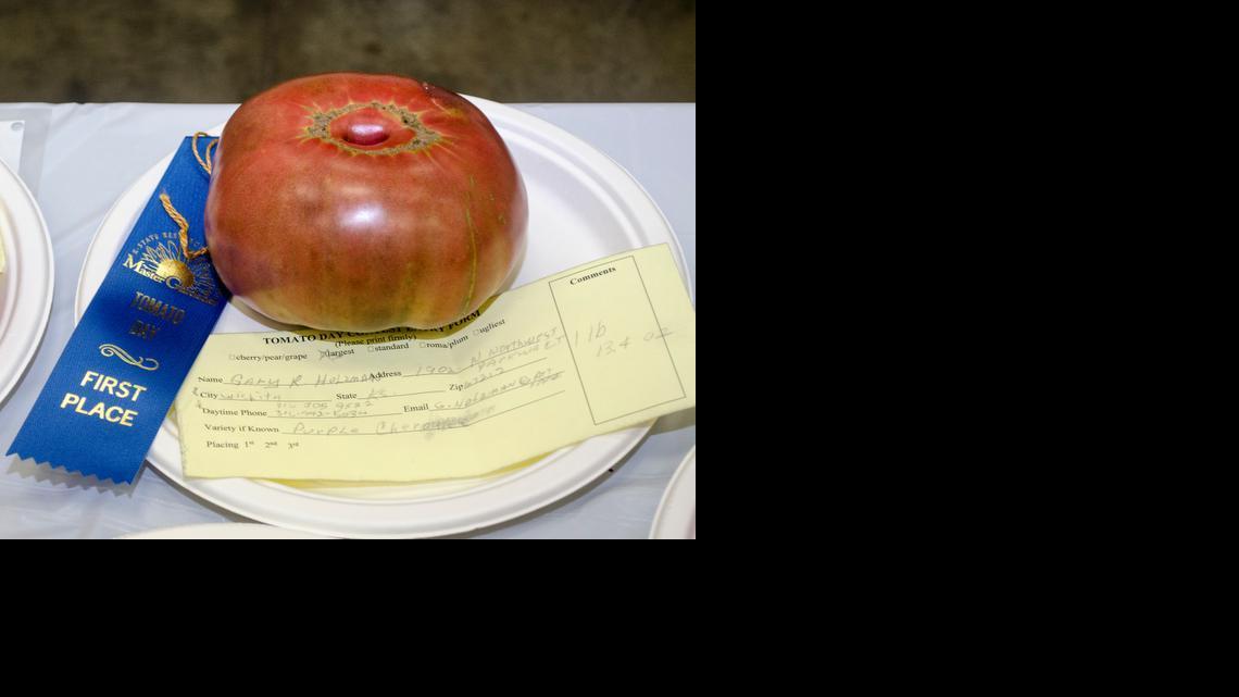 Gary Holzman of Wichita had the largest tomato at Tomato Day, a 1-pound, 13-ounce Cherokee Purple. 

