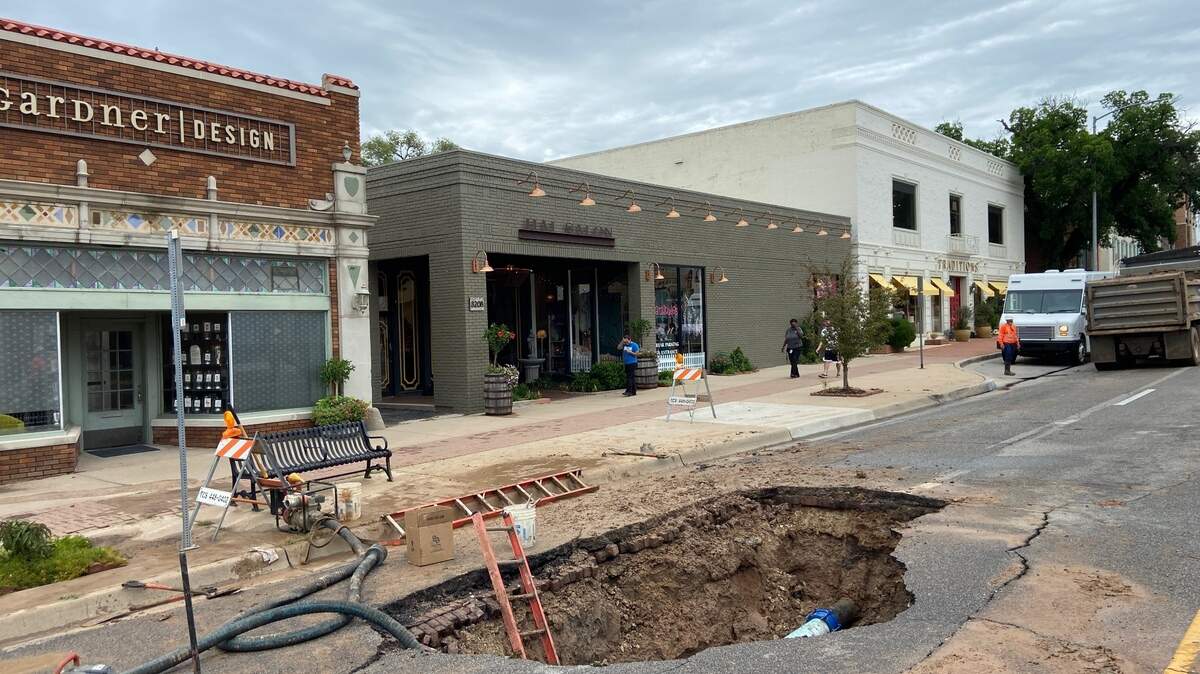 Workers have been trying to fix a large sinkhole Tuesday morning on Douglas just east of Hillside.