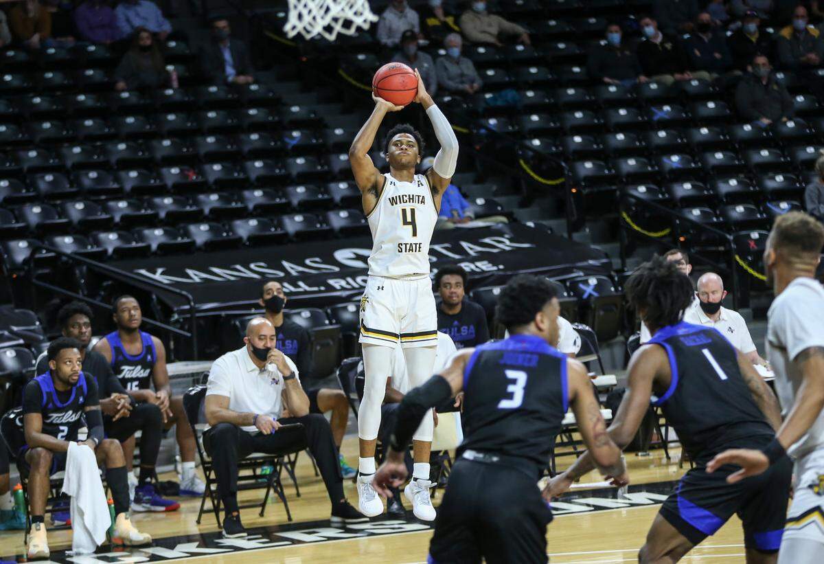 Wichita State’s Ricky Council IV hits a three pointer late in the first half against Tulsa at Koch Arena on Wednesday.