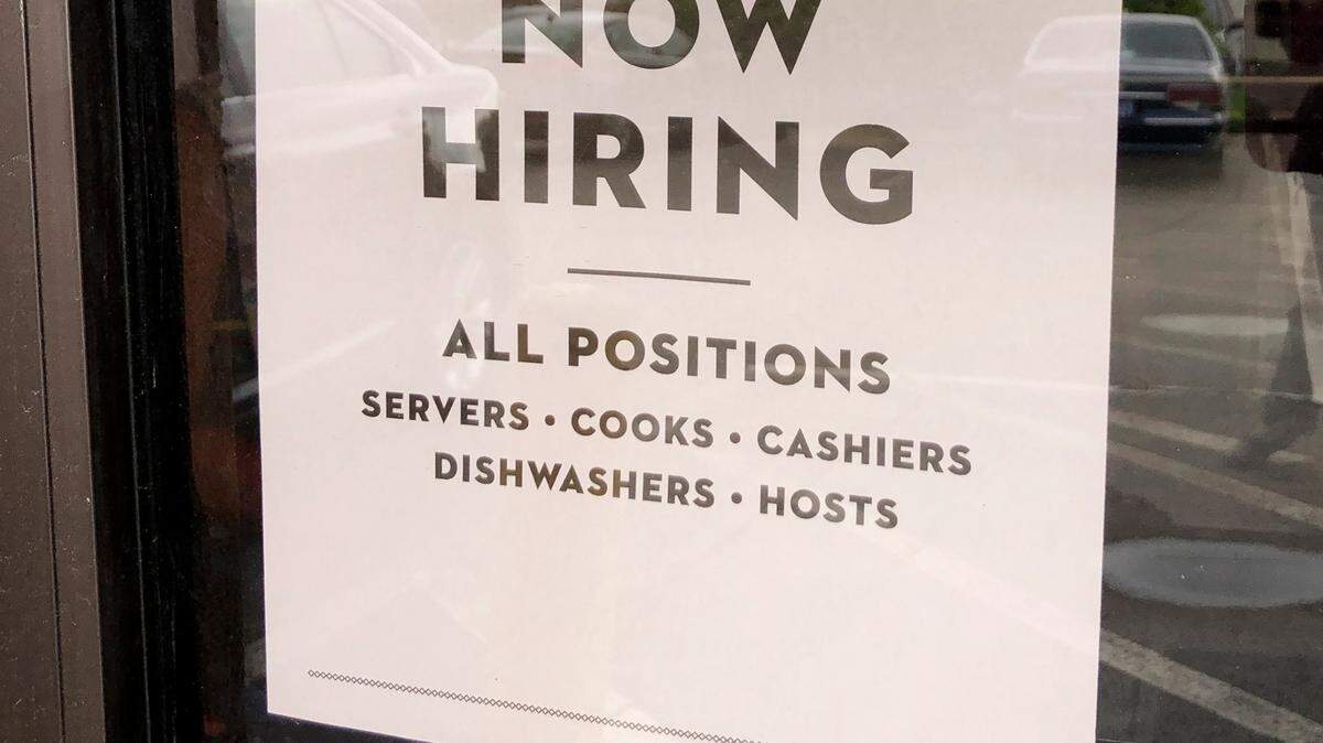 A sign posted on the front door of a Wichita restaurant seeking to fill all positions. Young adults are well-positioned in the summer job market, and the Wichita Workforce Center will help them find employment this summer through two new grants.