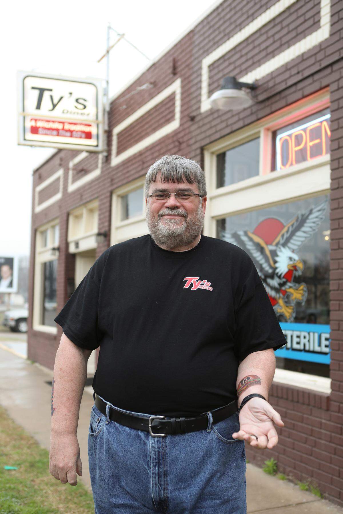 Mark Klamm. A 58-year-old process engineer group leader at Textron, had the Ty’s Diner logo tattooed on his left arm in exchange for free burgers for life. (March 29, 2019)