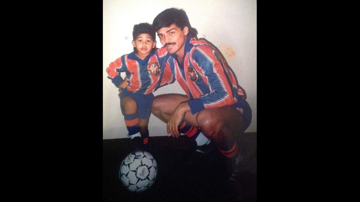 Wichita Wings legend Chico Borja, pictured above with his son during his playing days, died at the age of 61 on Thursday.