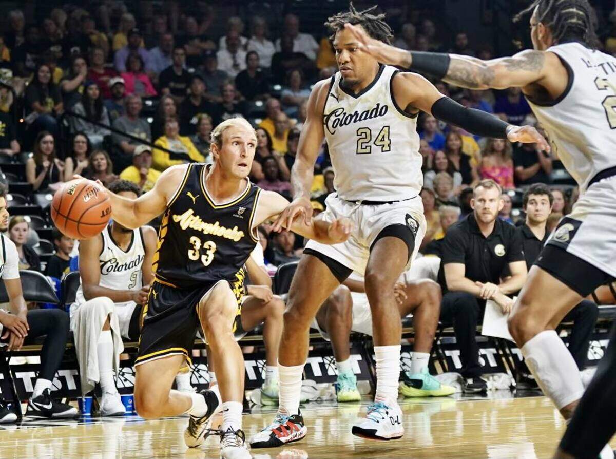 Conner Frankamp drives baseline for the AfterShocks in their regional semifinal game against Team Colorado in The Basketball Tournament at Koch Arena last summer.