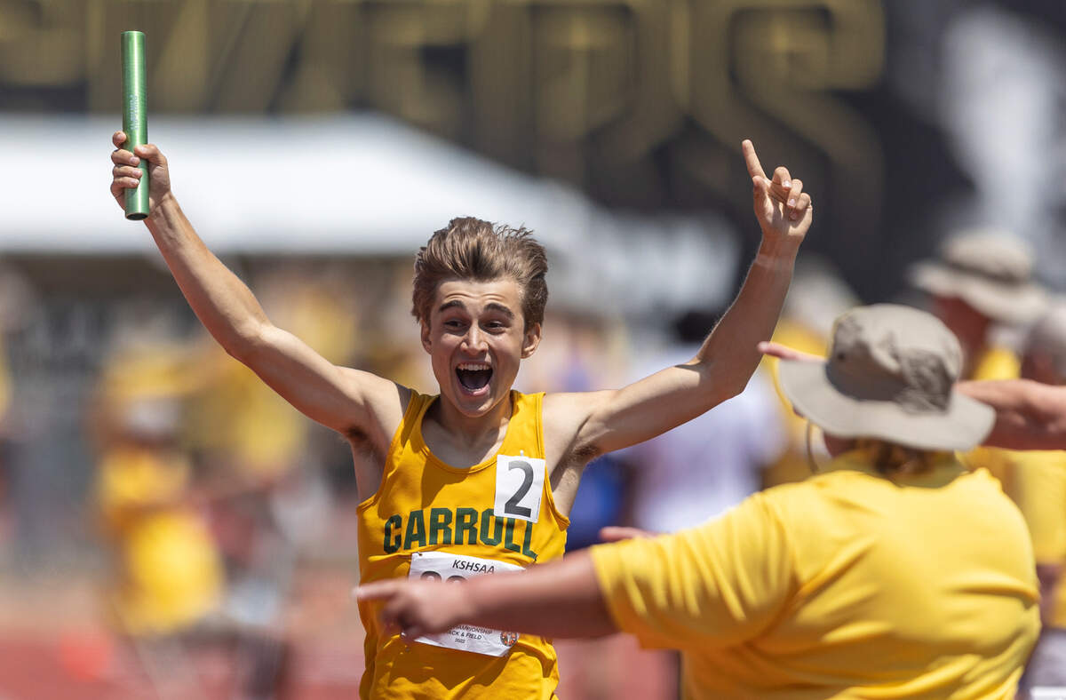 Bishop Carroll’s Carson McEachern cross the finish line in the 4x800 relay on Saturday at the Kansas State High School Track and Field Championships at Cessna Stadium on Saturday.