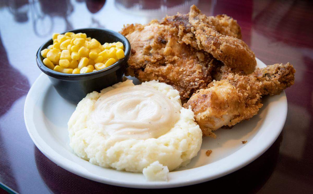 Fried chicken was the Wednesday special at Carolyn’s Essenhaus, in downtown Arlington. Carolyn Bontrager has been running the small-town cafe for 30 years.