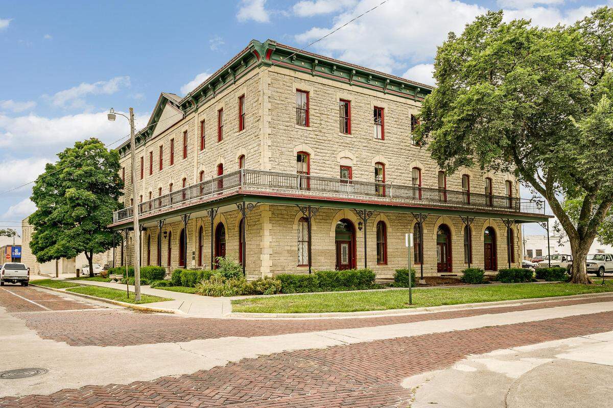 The historic Elgin Hotel and its new fine-dining restaurant are for sale or lease in the Flint Hills.