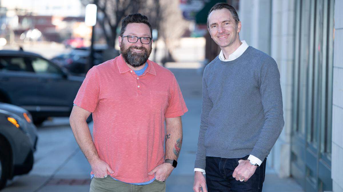 Justin Eklund, right, with employee Grey Stepp, has rebranded his JByron Marketing to Grove9 to better reflect what his business is about.