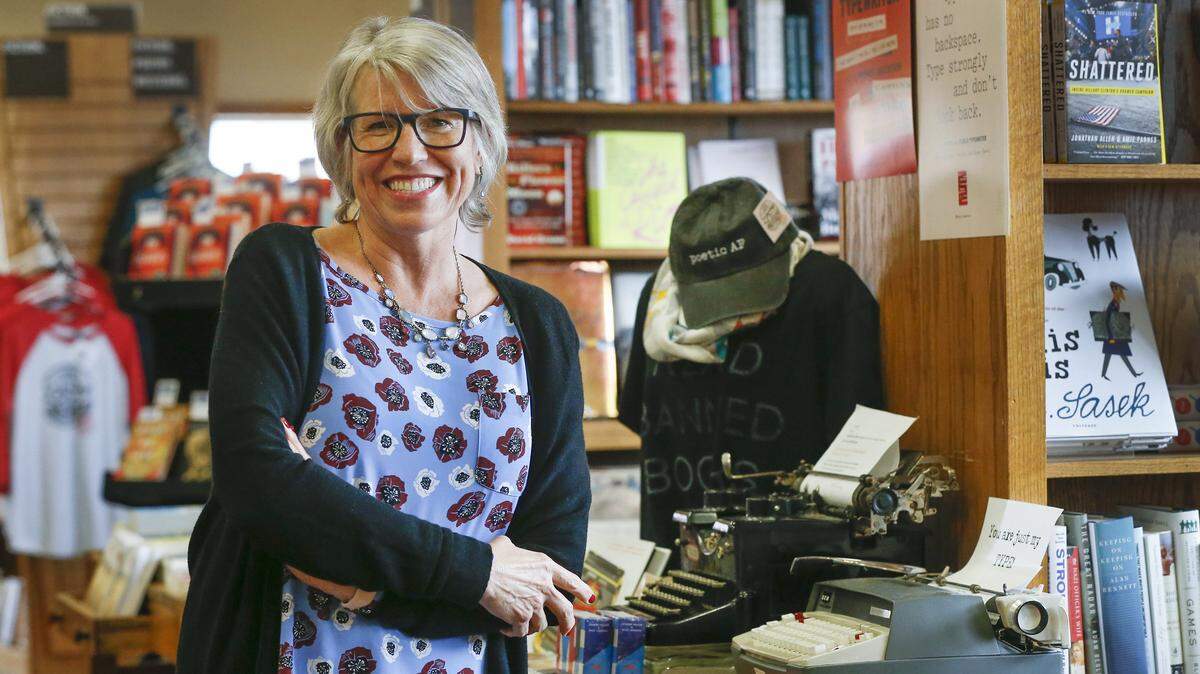 Watermark Books owner Sarah Bagby at her store at the corner of Douglas and Oliver Tuesday. (May 1, 2018)