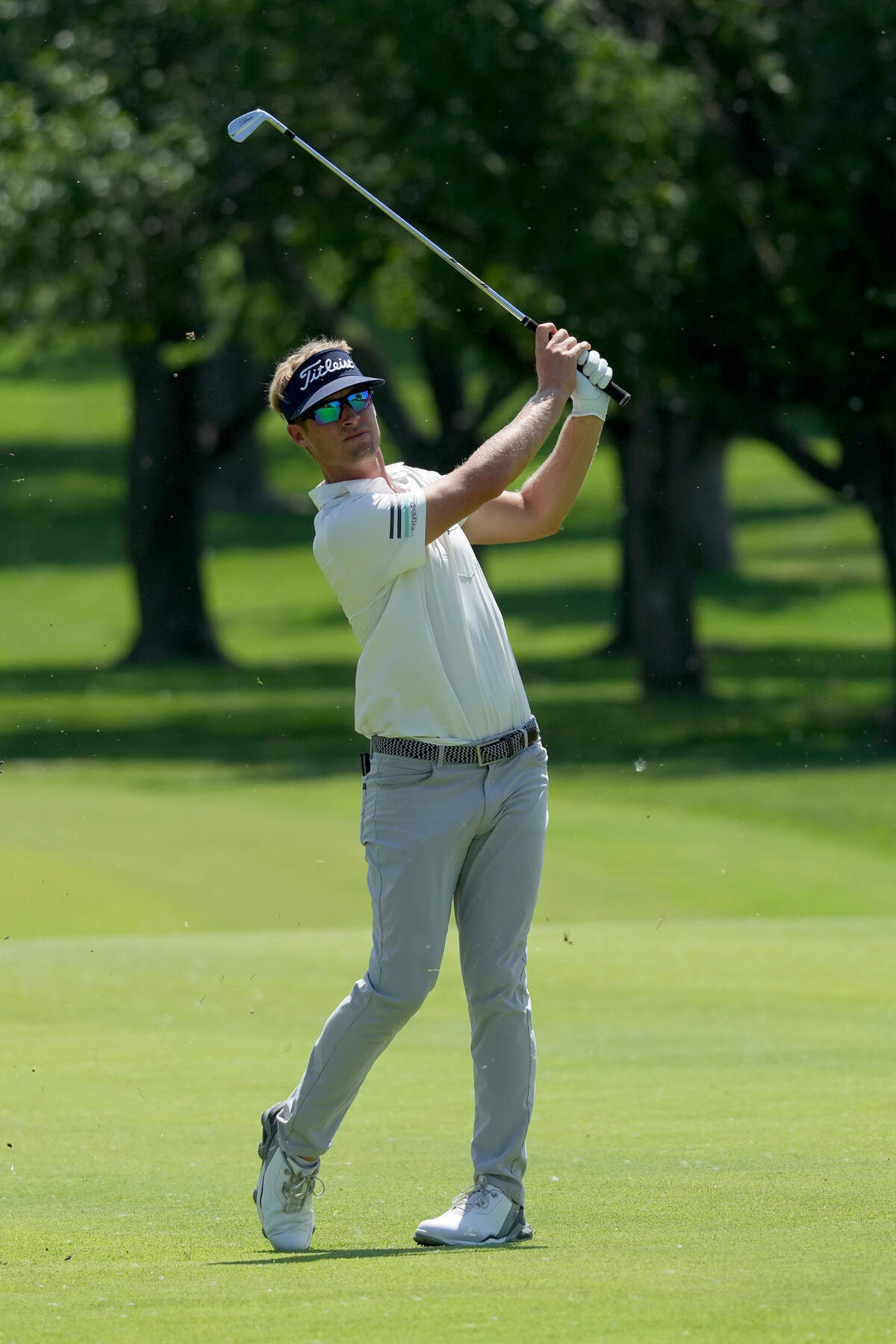 Tyson Alexander plays his shot on the ninth hole during the first round of the Wichita Open at Crestview Country Club on Thursday.