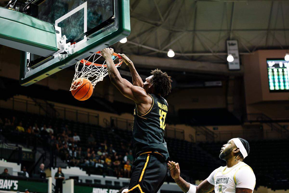 Wichita State center Quincy Ballard slam dunks in the first half against South Florida at Yuengling Center earlier this season.