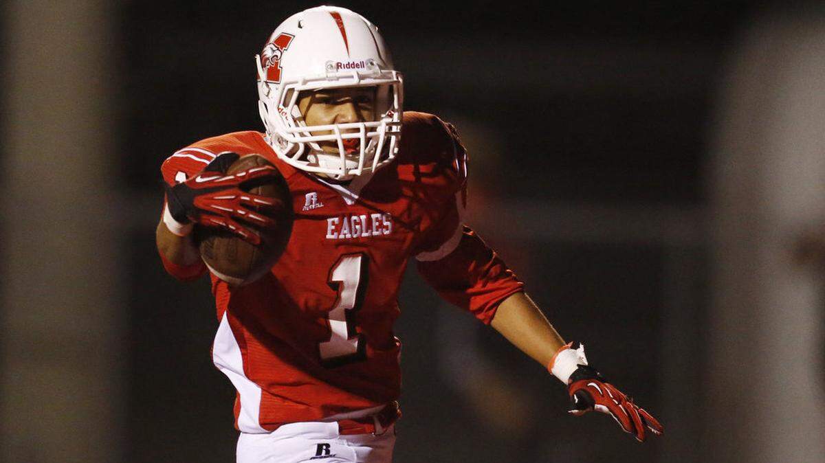 Maize running back Kendall Stewart scores the winning touchdown for Maize Friday night against Salina South. Kendall pulled in a pass from Connor Lungwitz with just seconds left of the clock to break a 21-21 tie.(Sept 28, 2012)