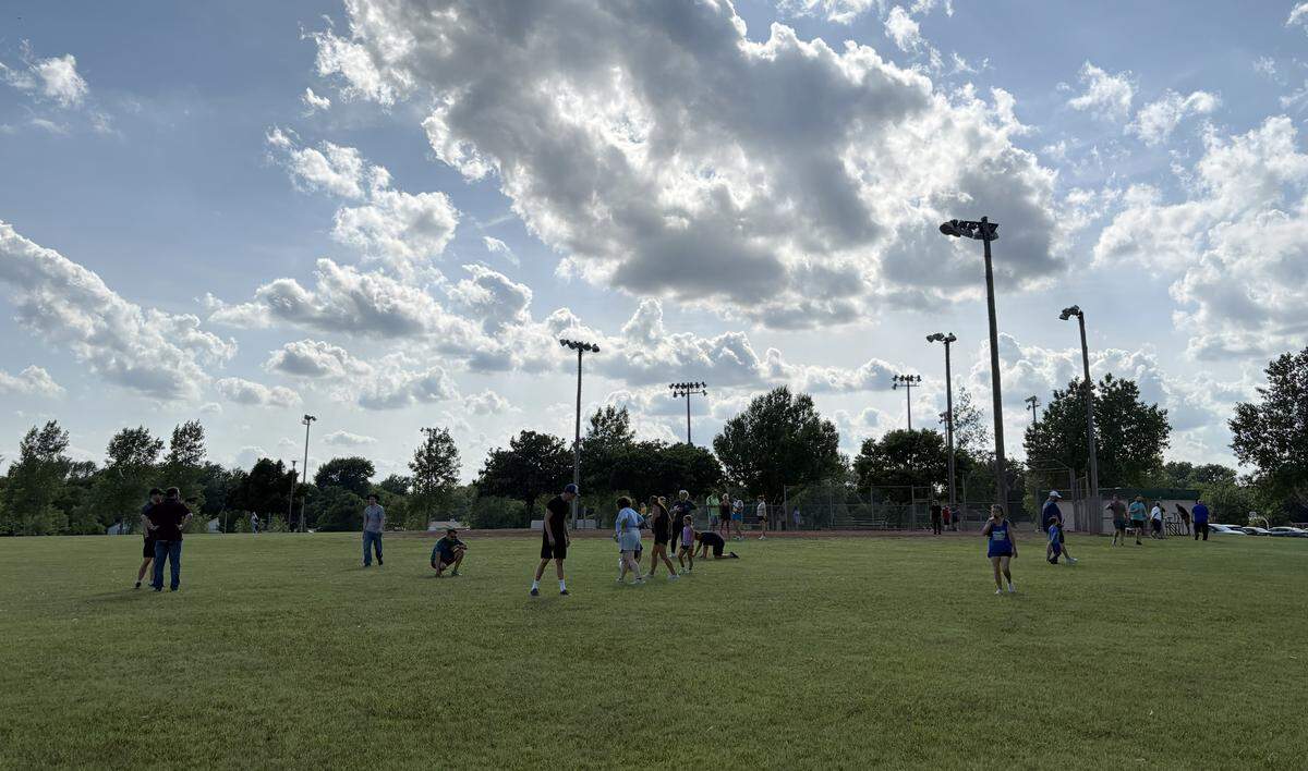 Ryan Philbrick took this photo on Wednesday of Eagle medallion hunters at Cessna Park. Philbrick found the medallion for the second time in 3 years. He worked with  two other friends to decipher the clues and found it in Cessna Park.