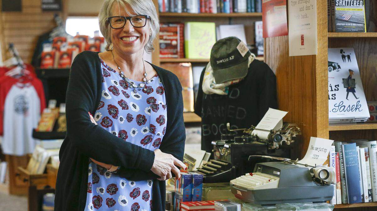 Watermark Books owner Sarah Bagby at her store at the corner of Douglas and Oliver. (May 1, 2018)