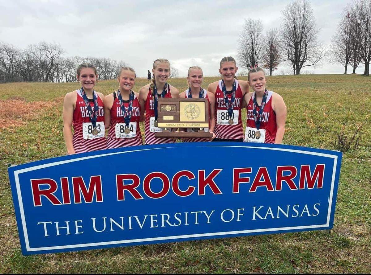 The Hesston girls cross country team won the Class 3A team championship on Saturday.