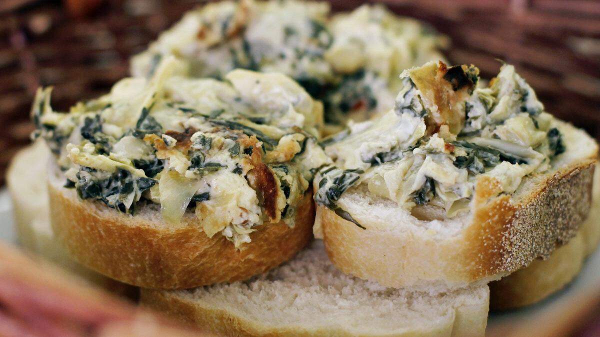 This spinach and artichoke dip would be perfect for a Super Bowl party.