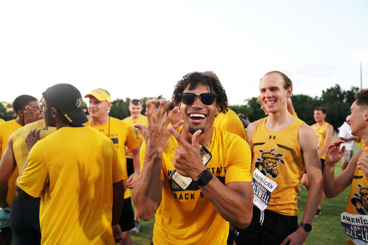 Wichita State’s Nate Vann celebrates the Shockers’ upset victory over Houston to win the men’s team race at the American Athletic Conference Outdoor Championships in Tampa on Sunday.