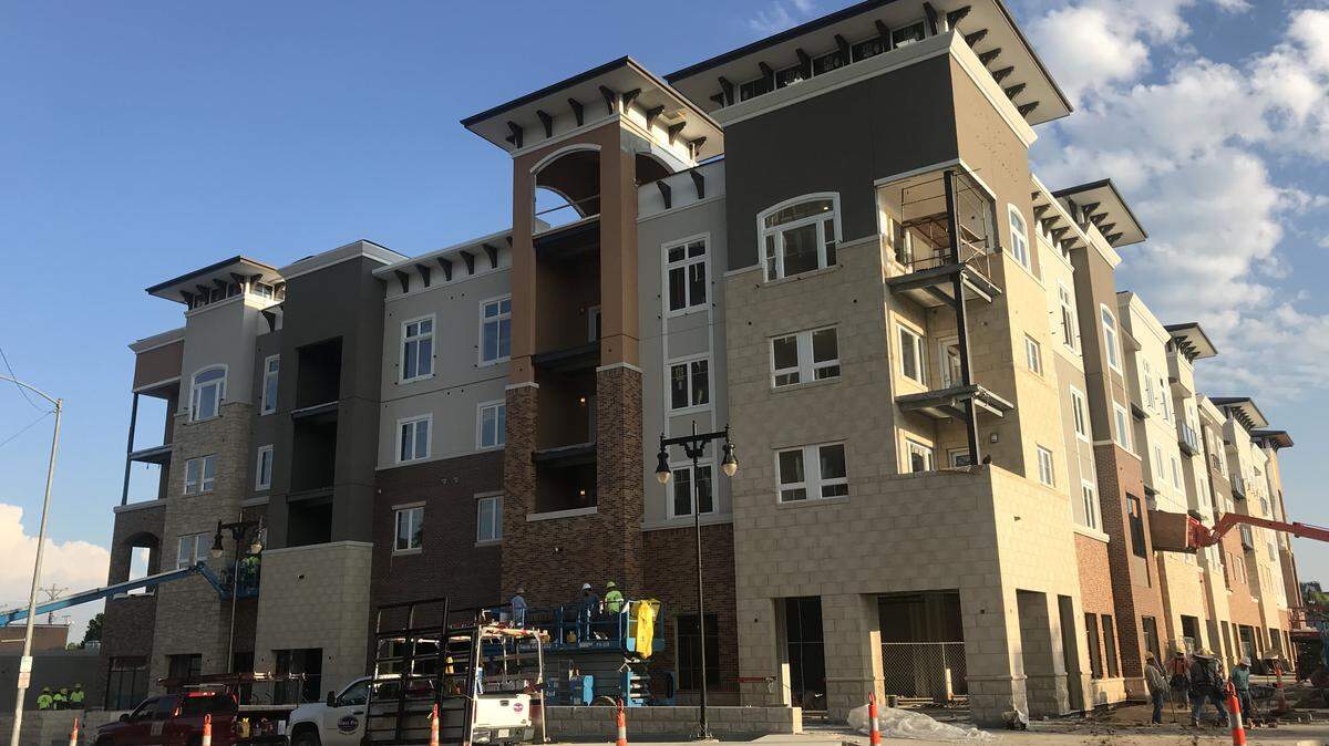 Uptown Landing, the apartment building under construction at Douglas and Rutan, will have several businesses on the first floor and likely at least one more restaurant.