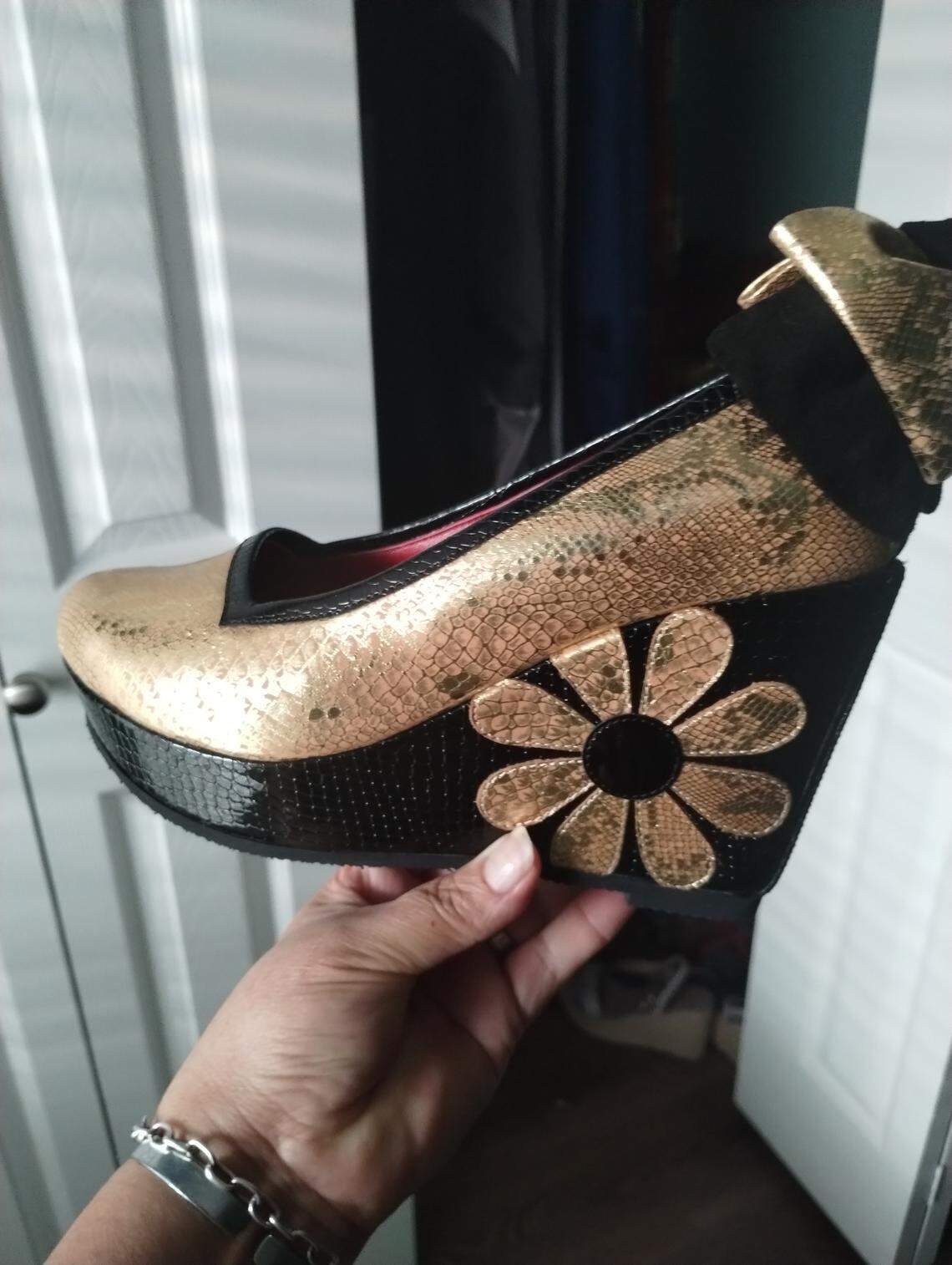 Wichita designer Aida Stenholm created these shoes exclusively for fellow designer Hazel Stabler and her recent show at Milan Fashion Week.