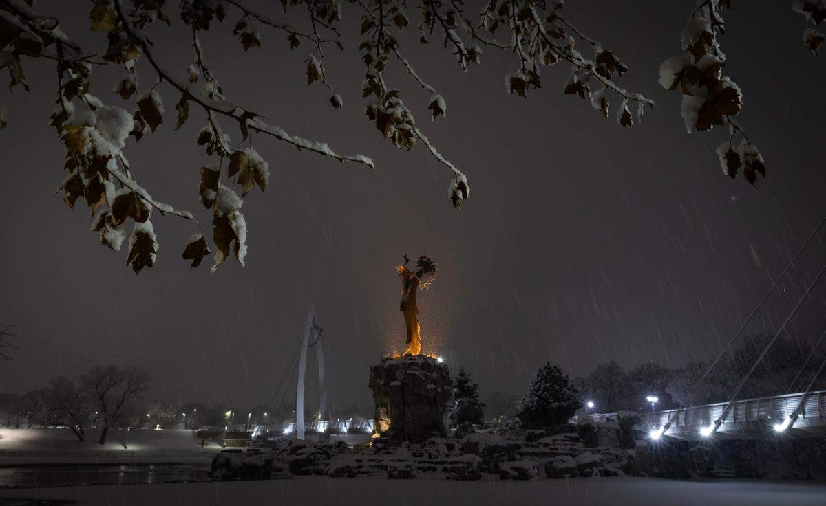 The Keeper of the Plains during a heavy snowfall in Wichita on Thursday night.