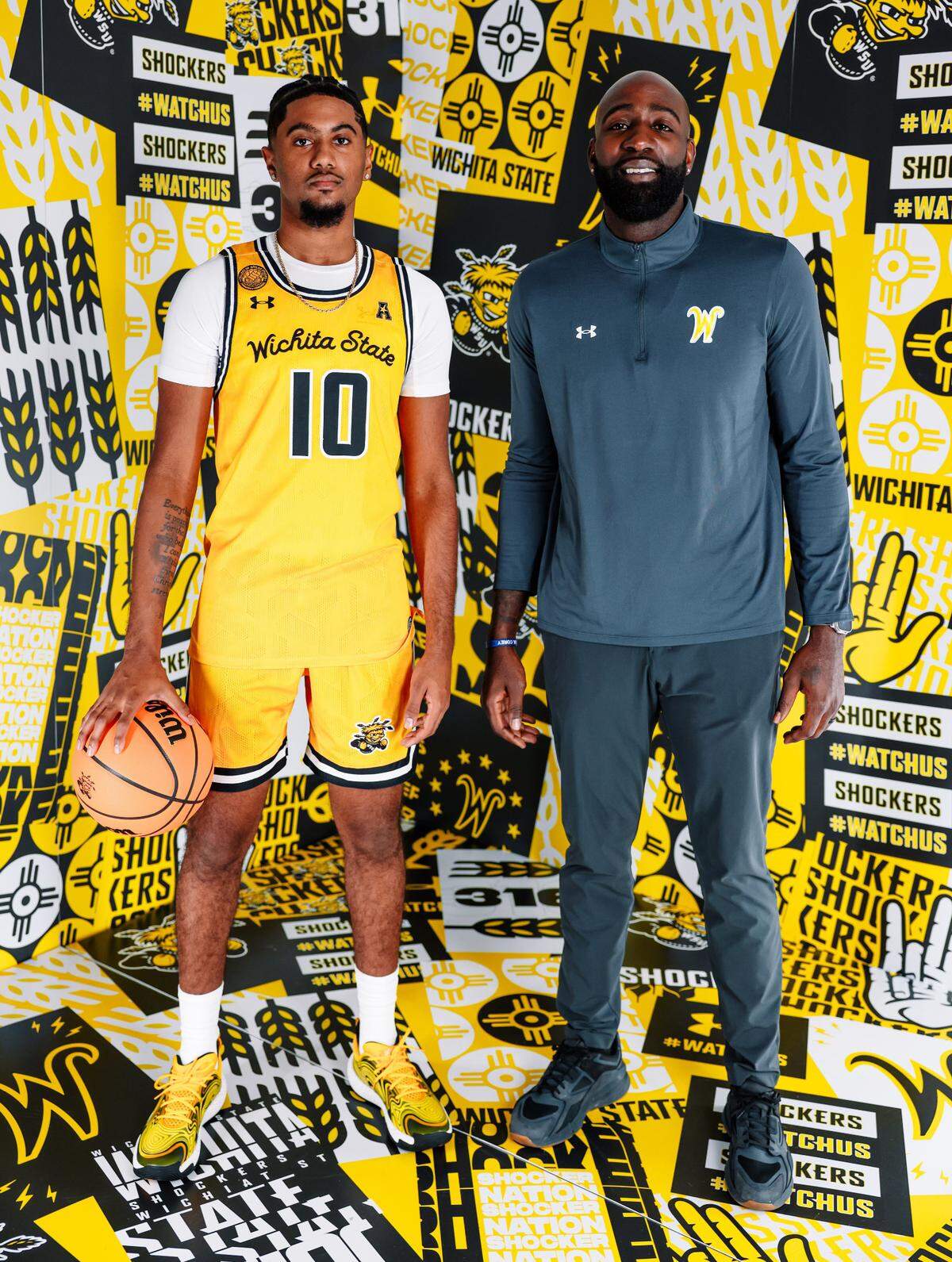 Tyrus Rathan-Mayes (left) stands next to WSU assistant Quincy Acy (right) on his official visit to Wichita State last week. The Canada native committed to the Shockers on Wednesday.