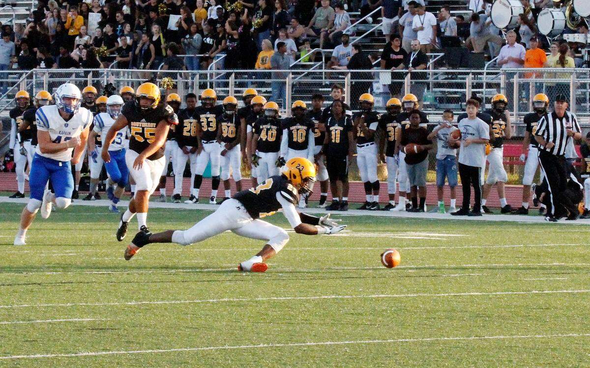 Wichita Southeast junior running back Knowledge McPherson falls on a fumble during the Golden Buffaloes 26-3 loss to Kapaun Mt. Carmel in Thursday’s season-opener. (Aug. 30, 2018)