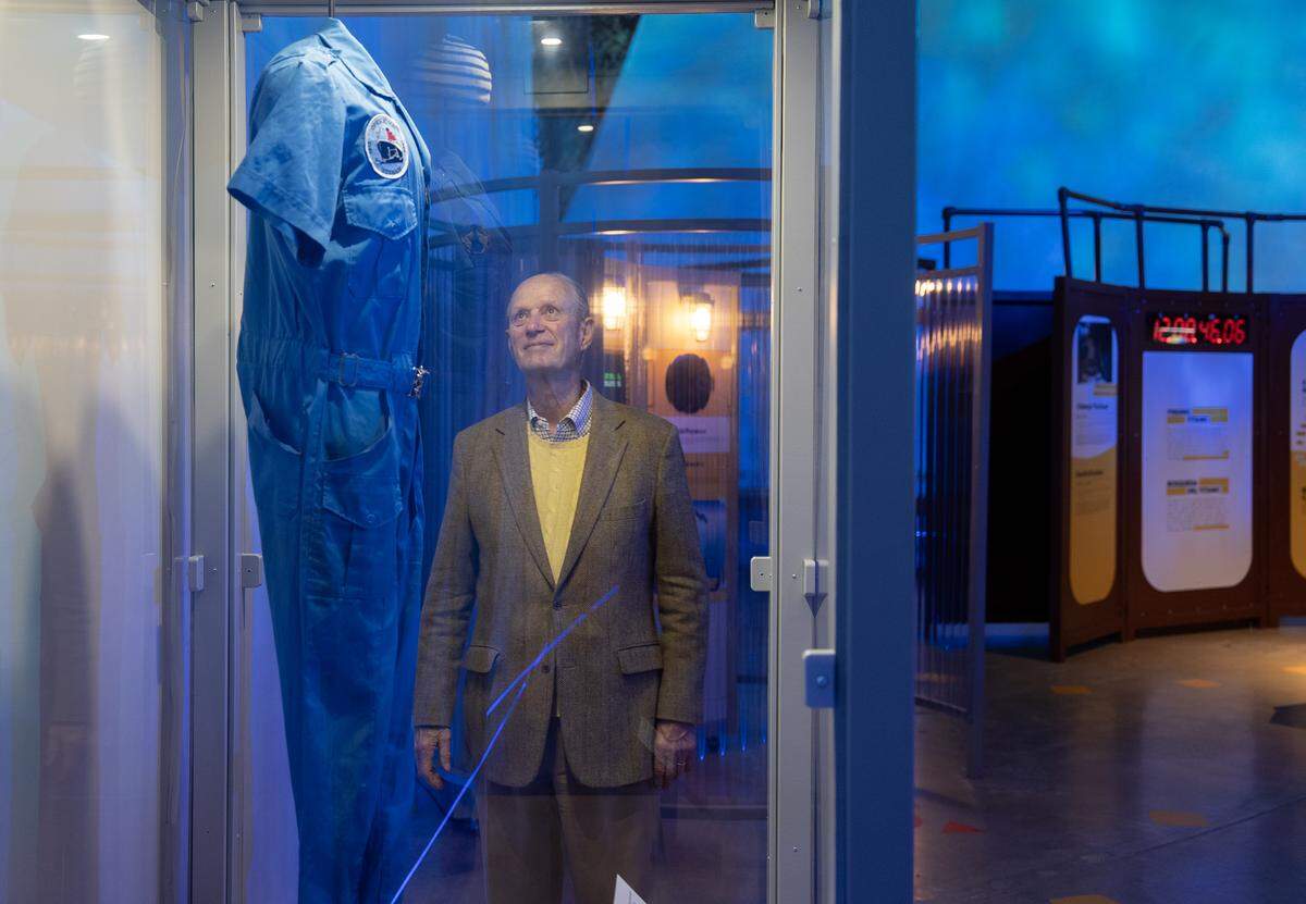 Wichita native Dr. Robert Ballard looks at his Navy jumpsuit on display at Exploration Place’s, “Finding Titanic: The Secret Mission.” Dr. Robert Ballard found the Titanic during a classified Navy mission. The traveling exhibit is open now through Sept. 7.