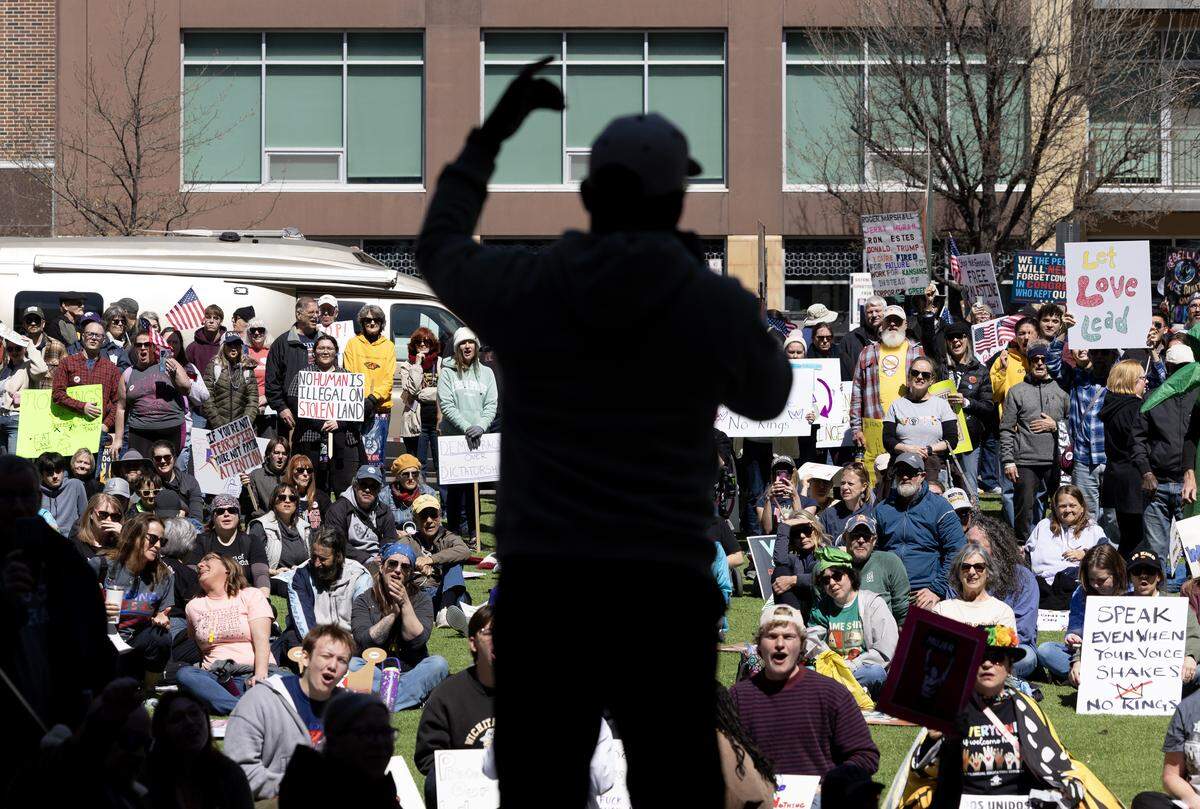 A large crowd listens to Wichita city council member Joseph Shepard speak during the “No Kings” protest in downtown Wichita on Saturday.