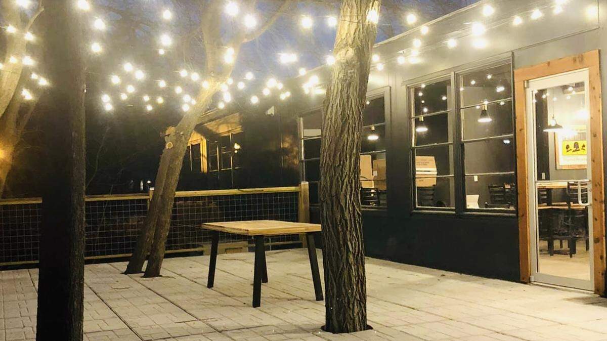 The 2,500-square-foot deck on the back of the new Old School Tap House & Social in Kechi is suspended over a creek.