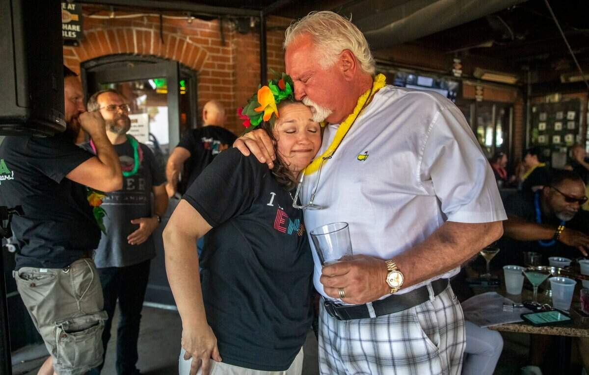 Mort's founder Morrie Sheets and operating partner Emma (Russell) Johnsen in 2022 on her 25th anniversary with the bar, which this week is celebrating its 30th anniversary.