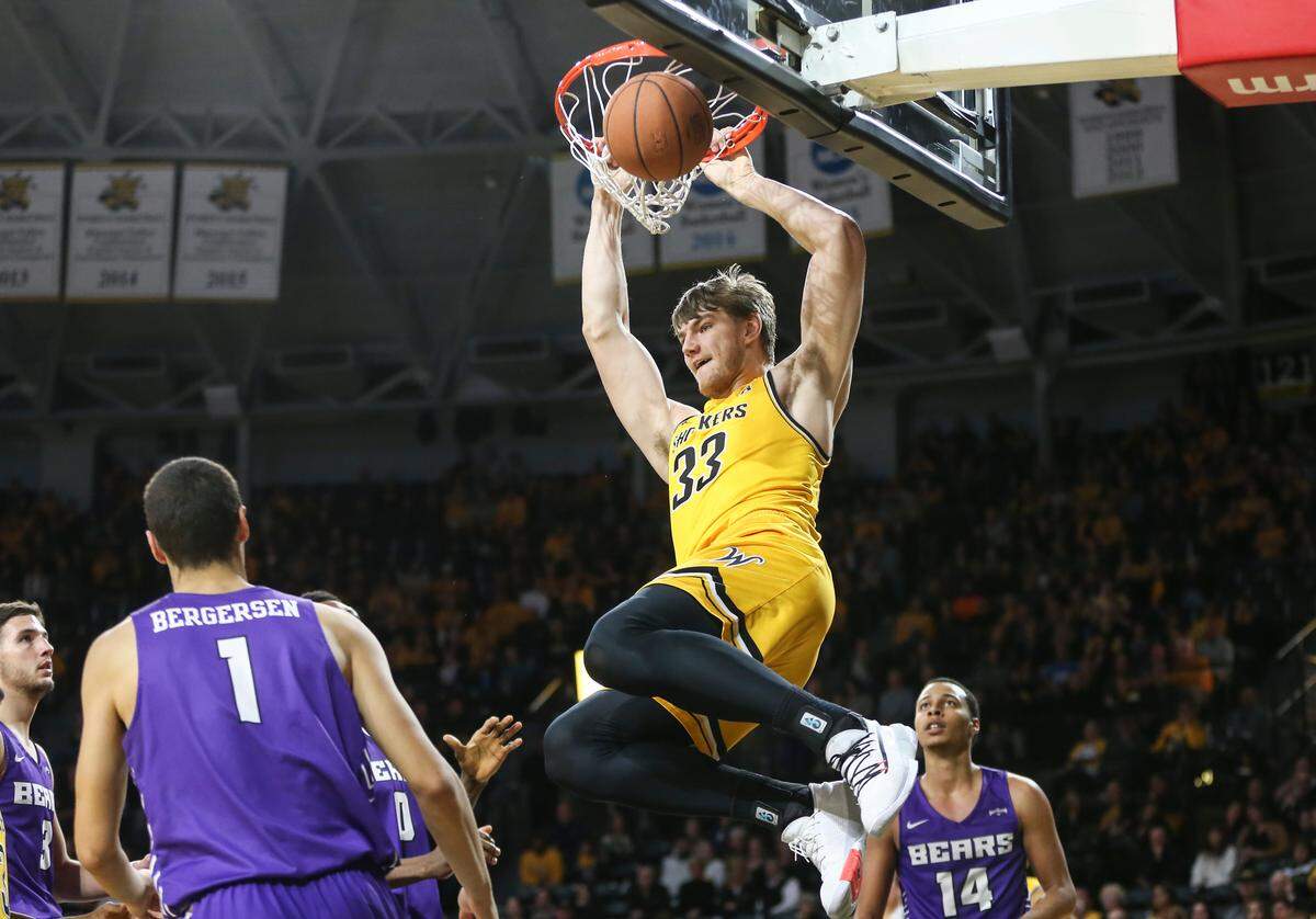 Wichita State’s Asbjorn Midtgaard dunks the ball during the second half of their game against Central Arkansas at Koch Arena on Thursday.