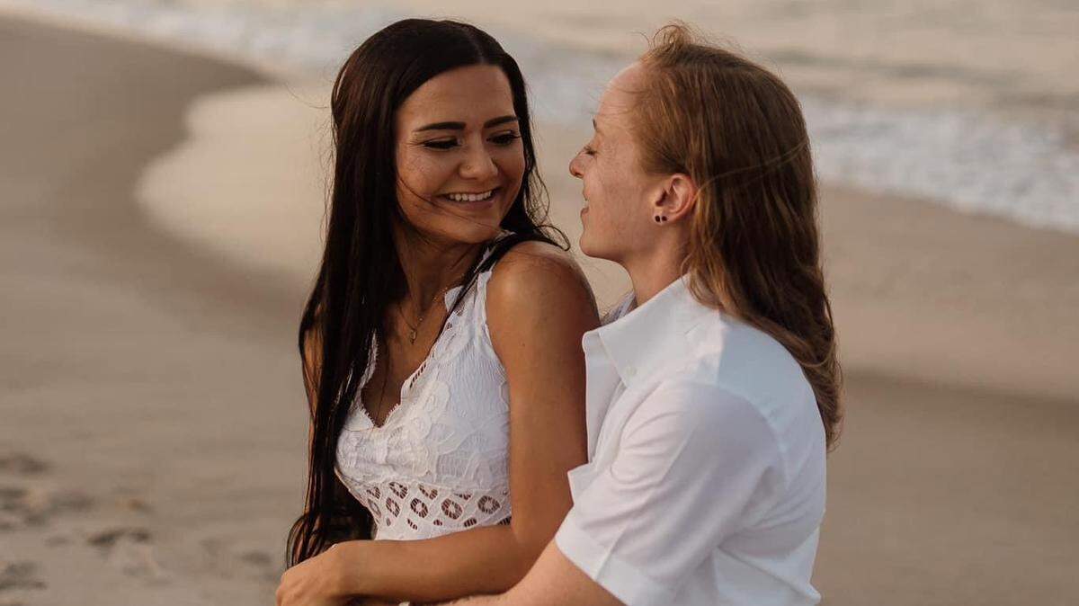Ali Waggy, left, shared on Facebook how she and her fiancee, Jessica Robinson, can’t get married at the Barn at Grace Hill in Newton as planned because of how the owners feel about gay marriage. She’s received an outpouring of support since then.