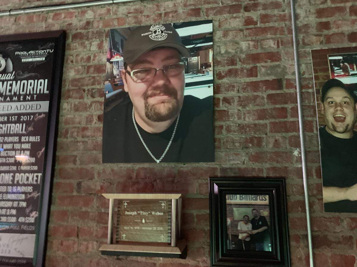 A shrine to Club Billiards’ late co-owner Joseph “’Tiny” Weber has been put up in the back of club next to its famous 1898 snooker table.