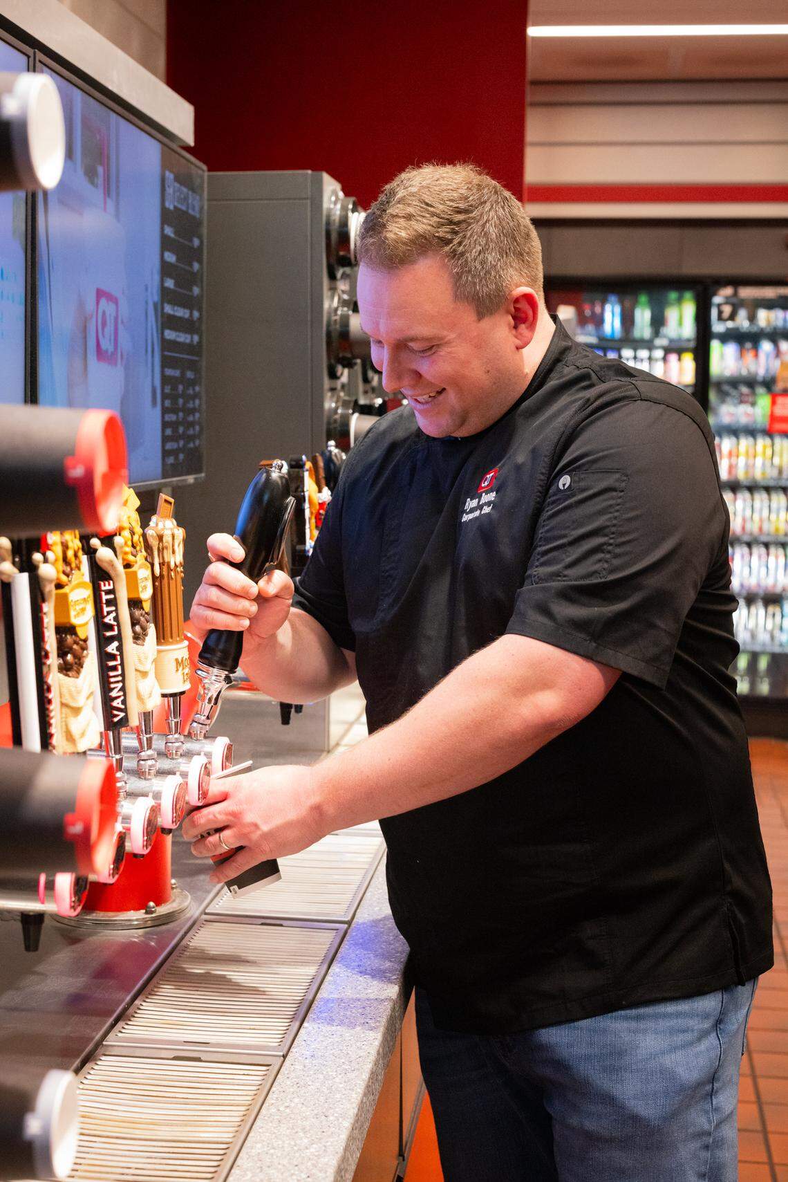 QuikTrip corporate chef Ryan Boone serves himself one of the coffee products he’s spent the last several years creating.