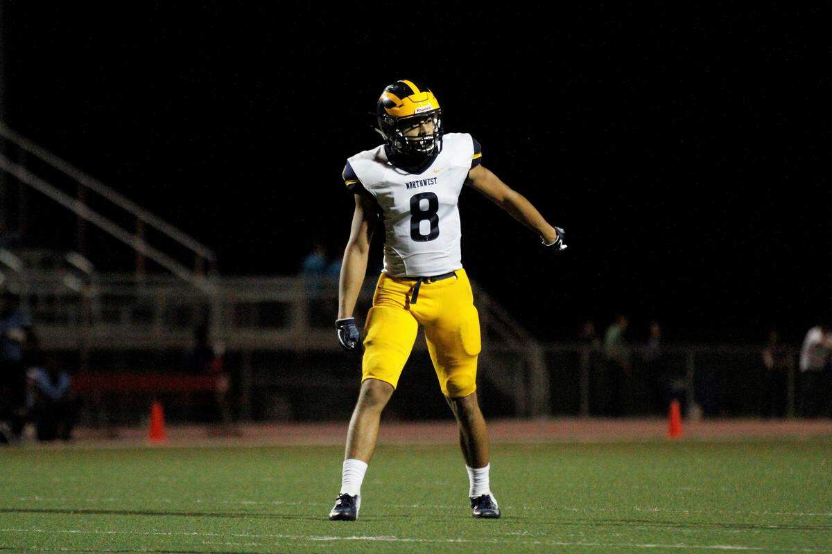 Northwest senior receiver Kale Patterson checks with the official before a play.