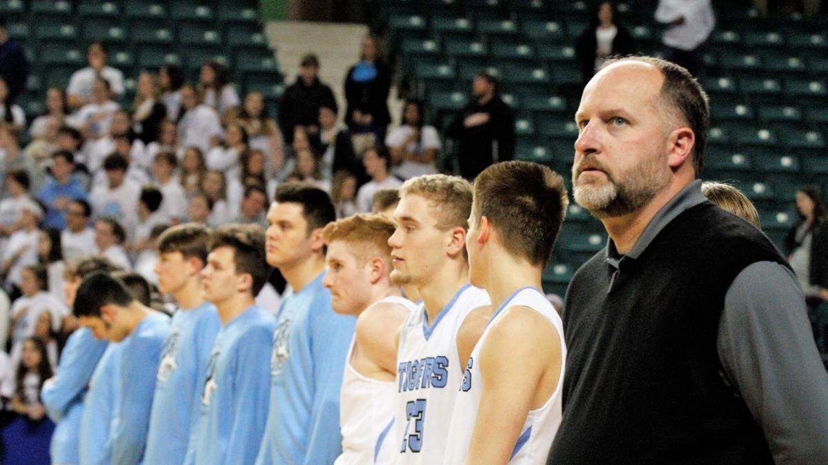 Boys basketball coach Steve Blue has led Eisenhower to three straight No. 1 seeds in the Class 5A tournament.