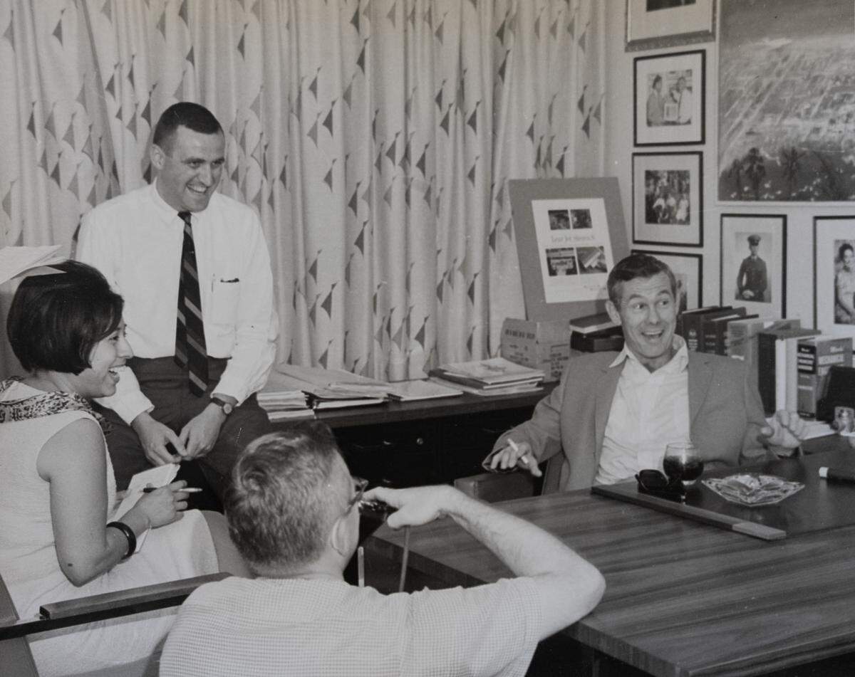 Al Higdon, left, with comedian Johnny Carson, right.